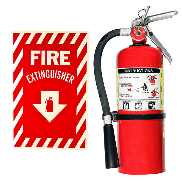 fire extinguisher and sign isolated fire extinguisher and sign isolated over a white background fire extinguisher photos stock pictures, royalty-free photos & images