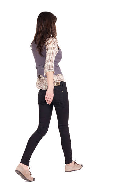 istock back view of walking woman . 153074643