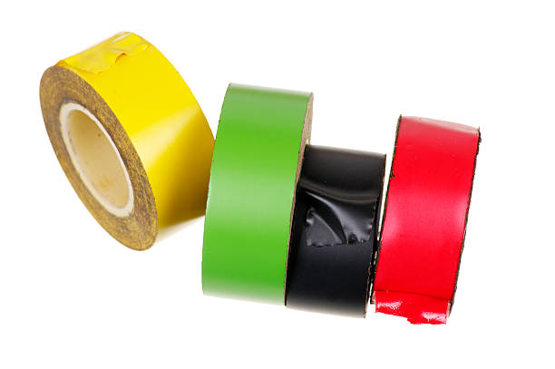 istock Reels Of Old Used Electrical Insulating Tape Isolated On White 153075132