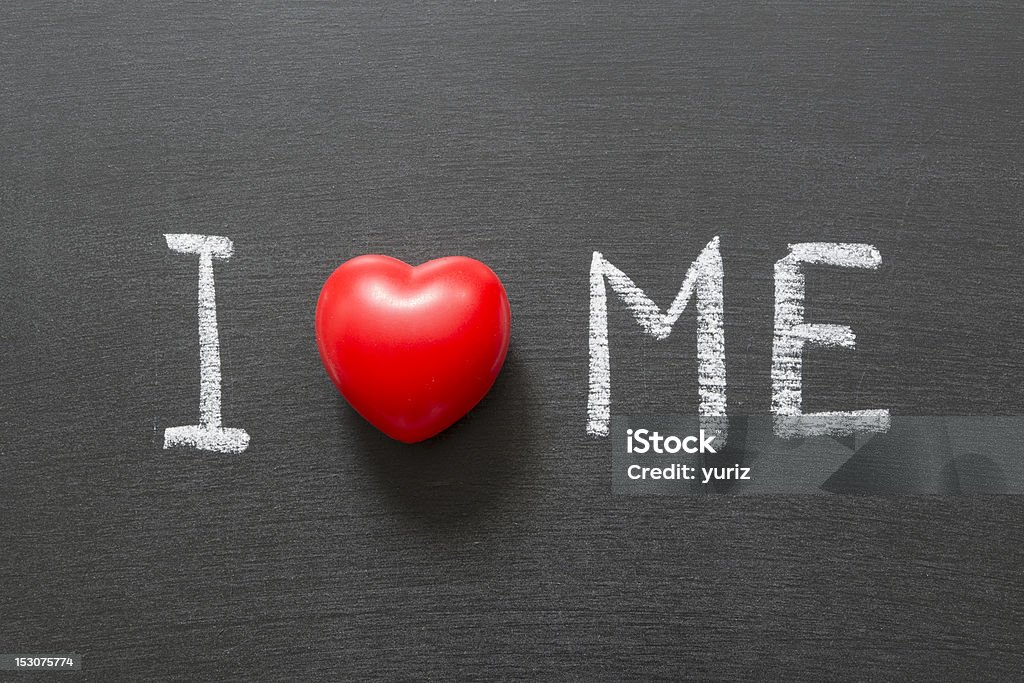 I love me I love me phrase handwritten on the school blackboard Black Color Stock Photo