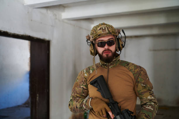 istock Modern warfare soldier portrait in urban environment 1530774381