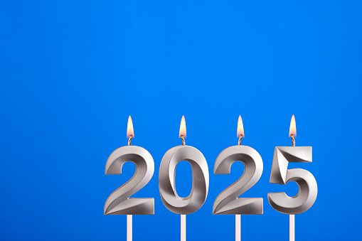 Candle number 2025 for happy new year - New years eve celebration on blue background