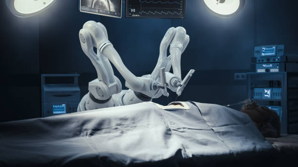 istock Modern Hospital: Surgery Patient Laying On Surgical Table While Robot Arms Performing High-Precision Nanosurgery. Automated Programmable Robotic Limbs Working On Heart Transplant On Person. 1530778932