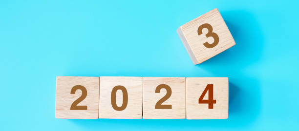istock wooden cube block with 2024 text on blue background. Resolution, plan, review, goal, start and New Year holiday concepts 1530779395