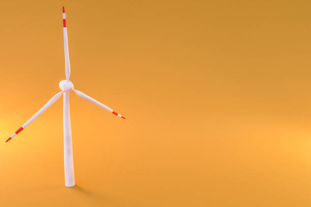istock colorfull infinite background; miniature windmill sustainablity renewable energy concept; 3d illustration 1530779426