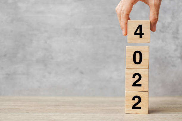istock hand holding block 2024 text on table. Resolution, strategy, plan, goal, motivation, reboot, business and New Year holiday concepts 1530779427