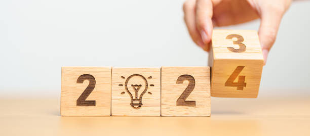 istock 2024 block with lightbulb. Business Idea, Creative, Thinking, brainstorm, Goal, Resolution, strategy, plan, Action, change and New Year start concepts 1530783715