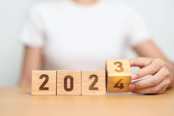 istock 2023 change to 2024 year block on table. goal, Resolution, strategy, plan, start, budget, mission, action, motivation and New Year concepts 1530784783