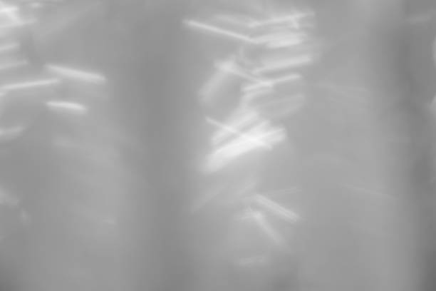 istock Gray wrinkled plastic wrap. Close-up of grey shiny vinyl wave texture background. 1530785172