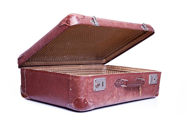 istock Vintage brown suitcase isolated over white background 153078710