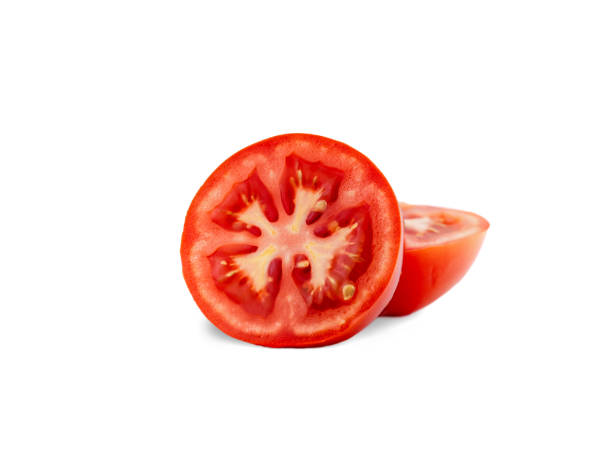 istock Cut and slice fresh red tomatoes isolated on white background. 1530792205