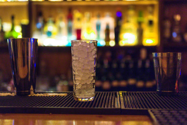 istock a glass with ice about to be served with an alcoholic drink 1530797219
