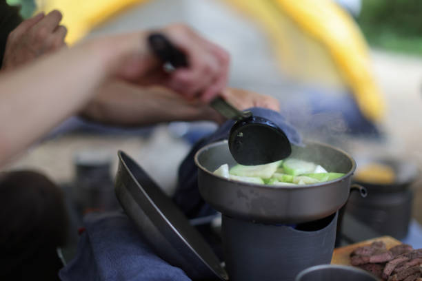 istock Cooking Lunch in the forest camping division 1530807965