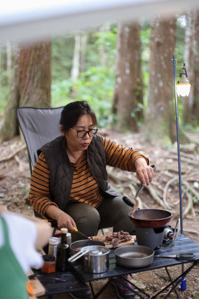 istock Cooking Lunch in the forest camping division 1530808064