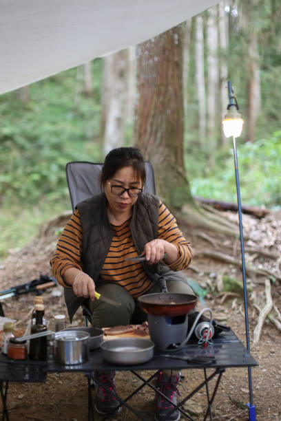 istock Cooking Lunch in the forest camping division 1530808066