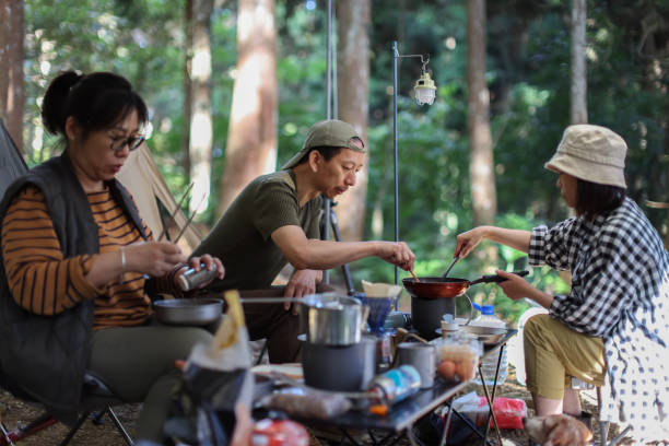 istock Cooking breakfast in the forest camping division 1530808433