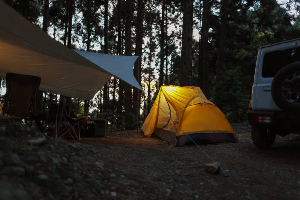 istock Early morning camping on alpine forest roads with a jeep 1530809718