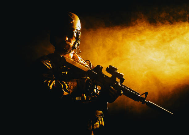 istock Bearded special forces soldier in the smoke 1530812163