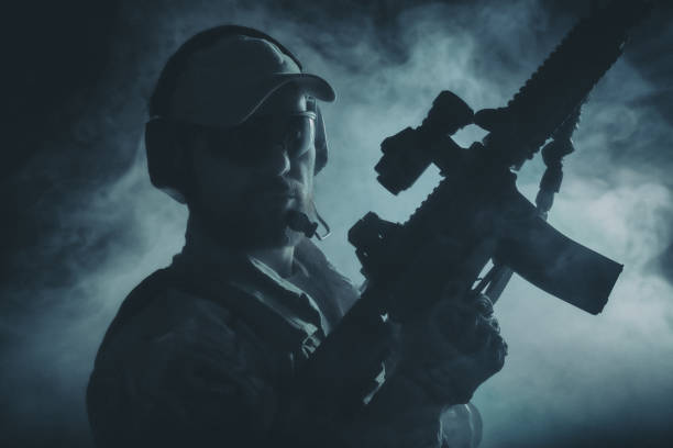 istock Bearded special forces soldier in the smoke 1530812740