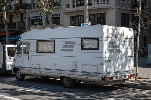 Barcelona, Spain – May 06, 2023: Detail of an old Hymer Mobil 2.5 TDI motorhome parked in the street