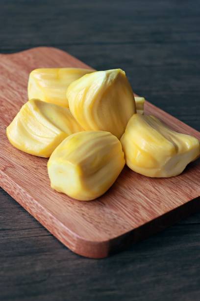 istock Fresh ripe jackfruit on a wooden cutting board 1530820172