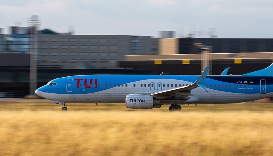 Hannover, Germany – June 30, 2023: The TUI fly Boeing 737 take off from runaway at Hannover airport (HAJ) in Germany