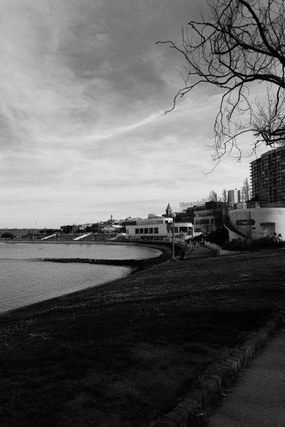 istock Grayscale featuring Ghirardelli Square in San Francisco, California, overlooking the beach 1530833919