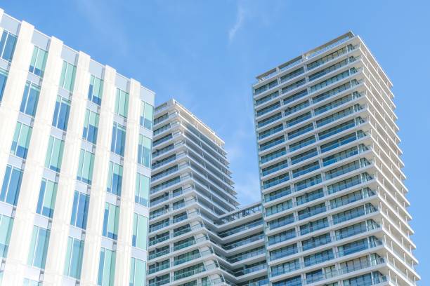 istock Low angle of a modern residential building against a blue sky 1530847518