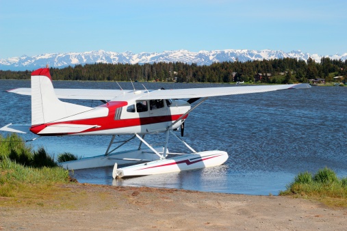 Floatplane ready to take off on Beluga Lake in Homer Alaska on a bright summer day