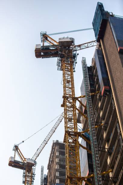 istock Construction site of a modern residential building with construction cranes. 1530865857