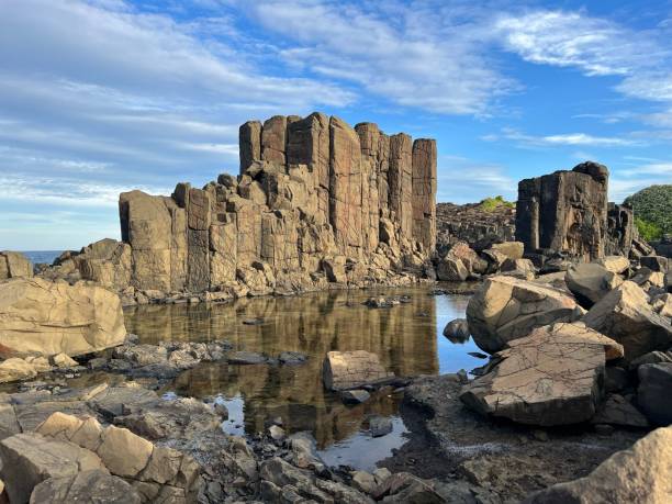 istock Scenic landscape featuring cliffs and a tranquil pond. Bombo Headland, Australia. 1530876865