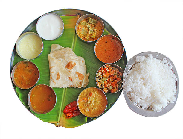 istock South indian plate meals on banana leaf isolated over white 153088080