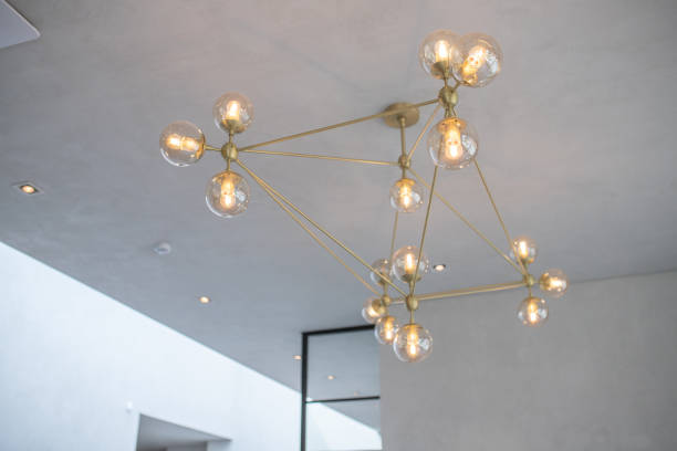 istock Modern loft chandelier in modern luxury minimalist light interior 1530885458