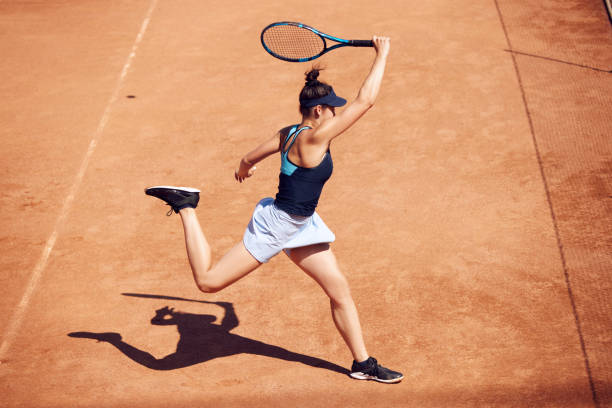 istock Dynamic image of professional athlete, tennis player in motion during game playing, training outside on warm sunny day 1530892926