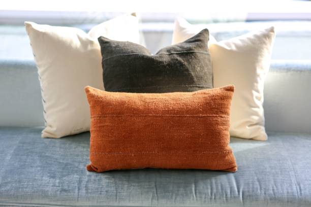 istock Cozy living room featuring a sofa and multiple decorative pillows 1530897227