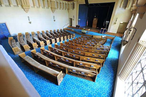 istock Rows of pews in a synagogue 153091439