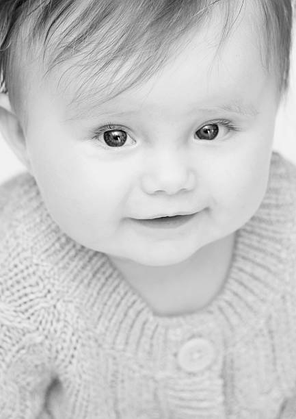 Cute baby in black and white. stock photo