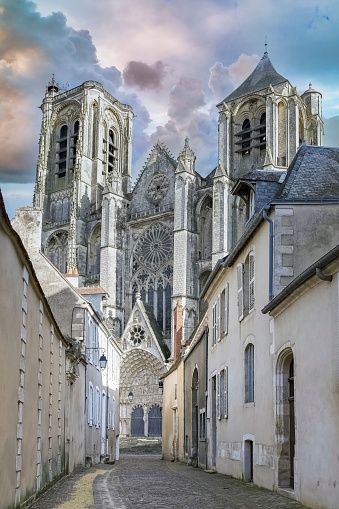 Bourges, medieval city in France, old houses in the historic center, with the cathedral in background