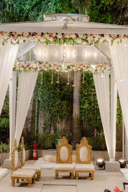 istock Vibrant outdoor wedding celebration featuring beautiful white chairs 1530931491