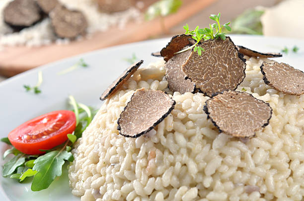 Truffle risotto Risotto with fresh black truffles tartuffo stock pictures, royalty-free photos & images