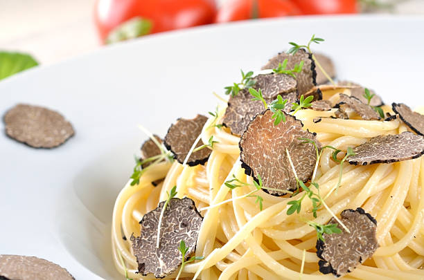 A spaghetti with fresh herbs and fresh truffles Pasta with fresh Italian truffle tartuffo stock pictures, royalty-free photos & images