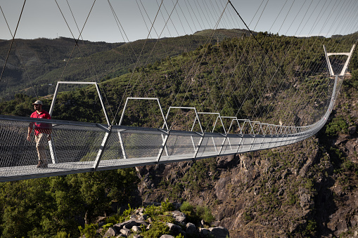 2 July 2023, Walking trough the 516 Suspension Bridge in AroucaGeoPark, Arouca, Portugal.