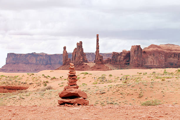 A hiking trail marking cairn in Monument Valley, Arizona, US
