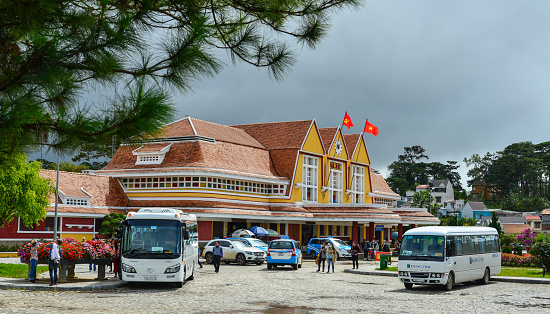 Dalat, Vietnam - Nov 25, 2017. Parking lot of old railway station in Dalat, Vietnam. The station was designed in 1932 by French architects Moncet and Reveron, and opened in 1938.