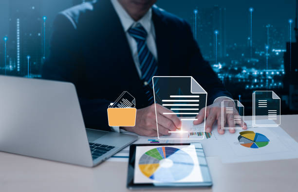 istock Document management, electronic signatures, and paperless offices On a digital tablet and virtual screen, a businessman signs an electronic document using a stylus pen. 1530975534