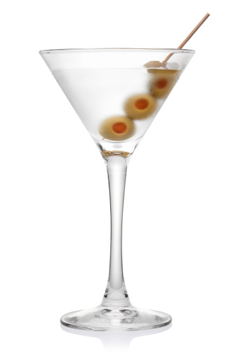 Martini with olives, isolated on the white background, clipping path included.