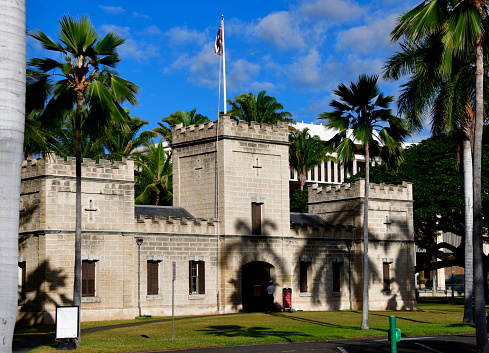 Honolulu, Oahu, Hawaii, USA: Iolani Barracks near 'Iolani Palace, built in 1870 for the Royal Guard of  King Lot Kapuaiwa, architect Theodore Heuck - inspired in medieval castles, with crenelated parapets and towers and built with blocks of coral limestone -  Hawaii Capital Historic District