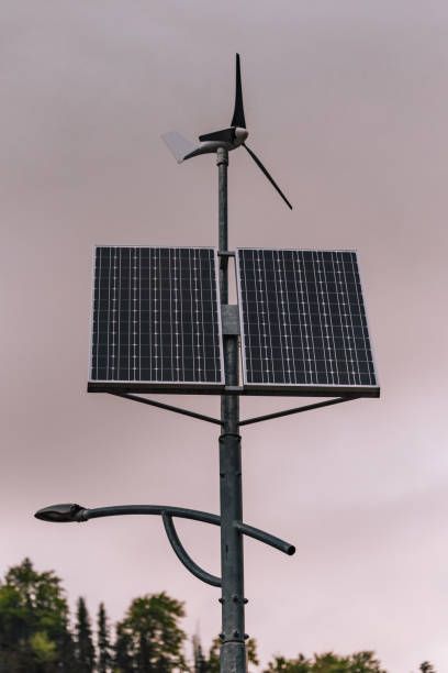 istock Solar small panel outdoors in the forest. Green energy concept photography, sun battery for power station. 1531003417