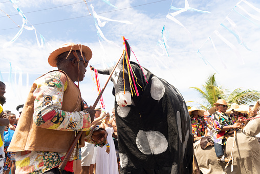 Salvador, Bahia, Brazil - February 02, 2023: Traditional cultural group from northeast Brazil perform during the festivities for Yemanja on Rio Vermelho beach in Salvador, Bahia.