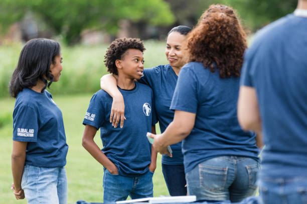 istock Mom interacts with son as sister watches 1531046780